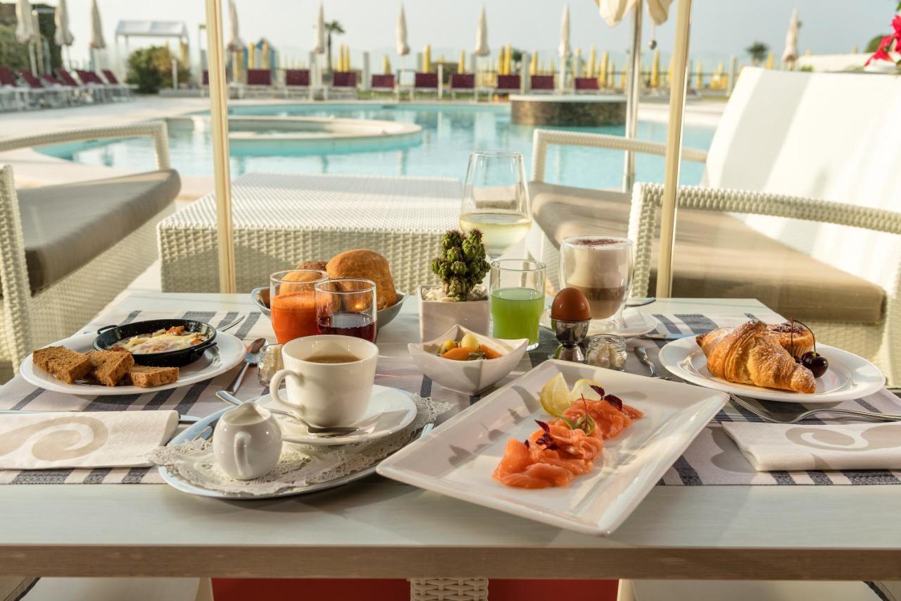 Baia Del Mar Beach Boutique Hotel Лідо-ді-Єзоло Екстер'єр фото